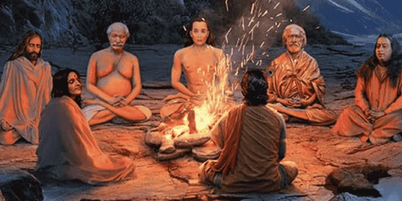 Yogi-meesters in meditatie rond een vuur